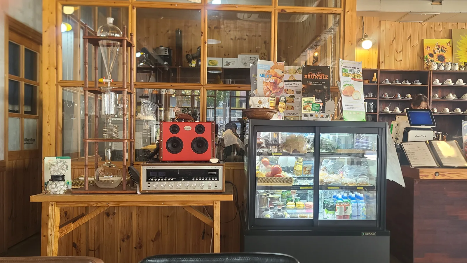 Cold-drip coffee equipment and display counter at Caffe Brazil Ponam