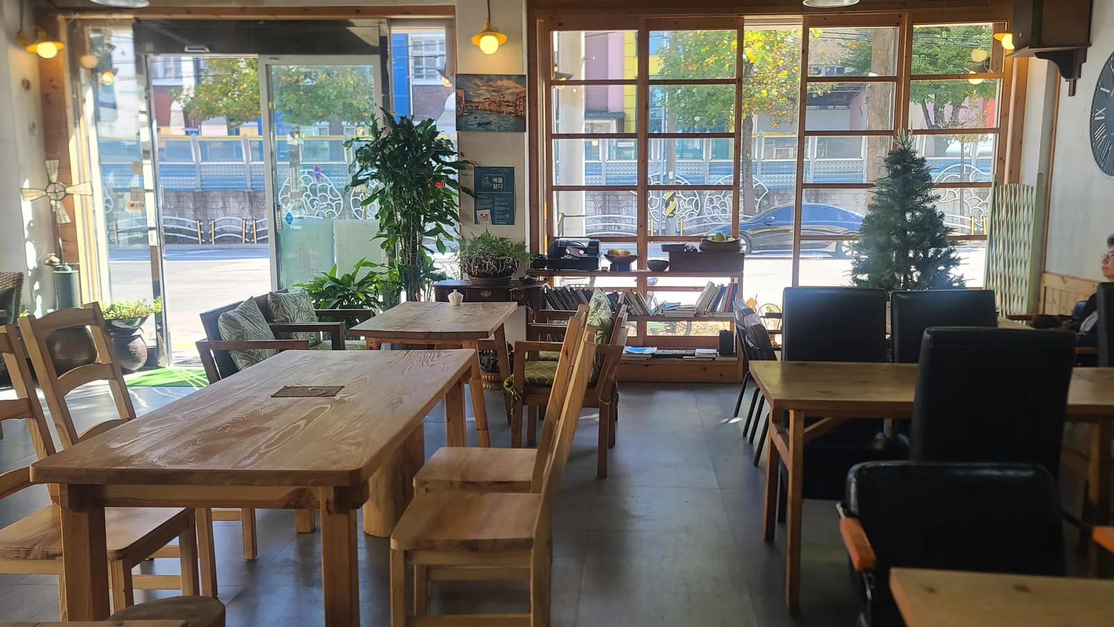 Wooden tables and window seating at Caffe Brazil Ponam